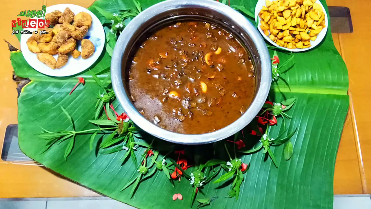 പരിപ്പ് പ്രഥമൻ - മലയാളത്തിന്റെ മധുരമായ പായസം തേങ്ങാക്കൊത്തും കശുവണ്ടിയും ചേർത്ത്